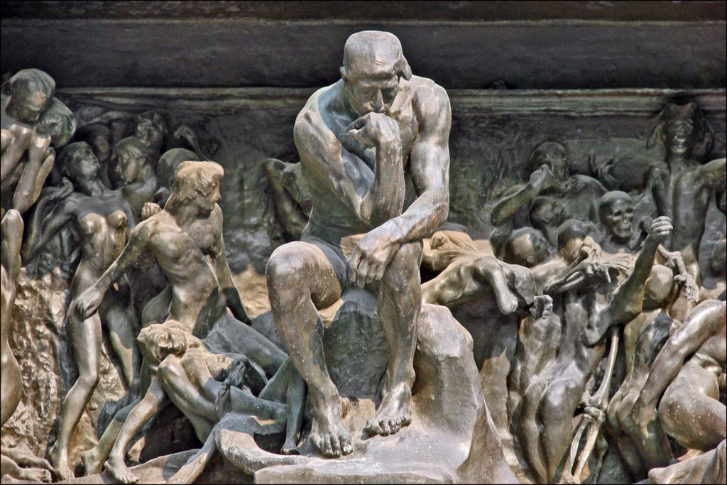 The Thinker in Auguste Rodin's sculpture The Gates of Hell. Image Credit: Wikipedia 